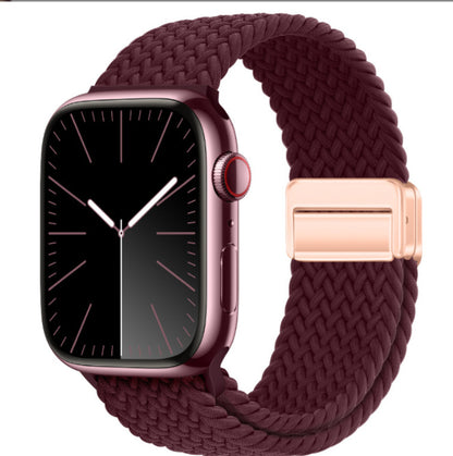 Smartwatch with a braided maroon band on a white background