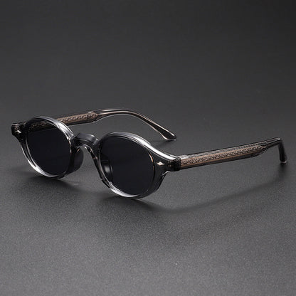 Pair of sunglasses with wooden accents on a dark gray background