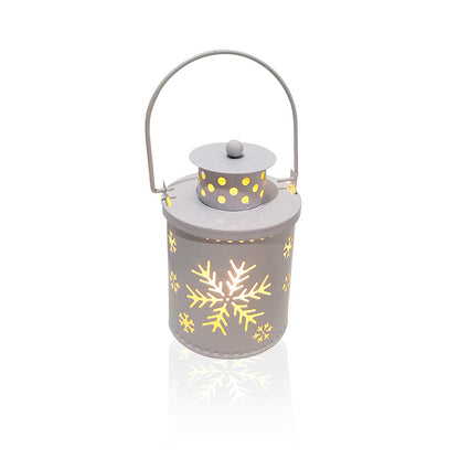 Decorative lantern with snowflake design on a white background