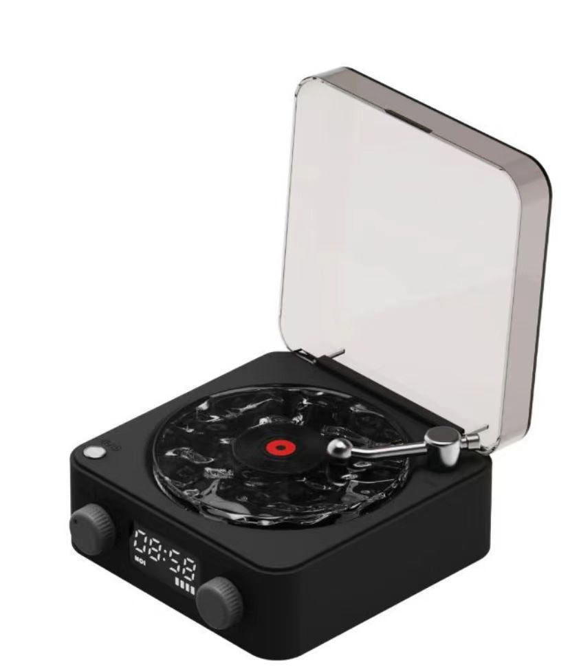 Black portable record player with a clear top cover on a white background