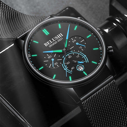 Black watch with green and blue accents on a dark background