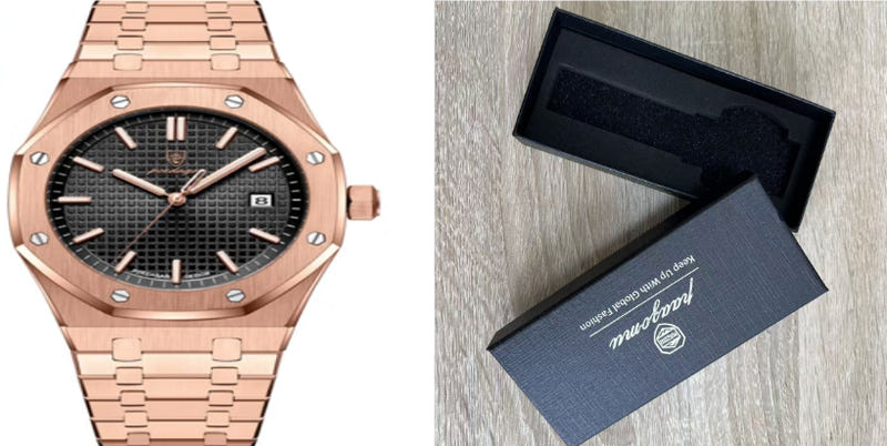 Rose gold quartz wristwatch with black dial and metal link bracelet, gold-tone hands.