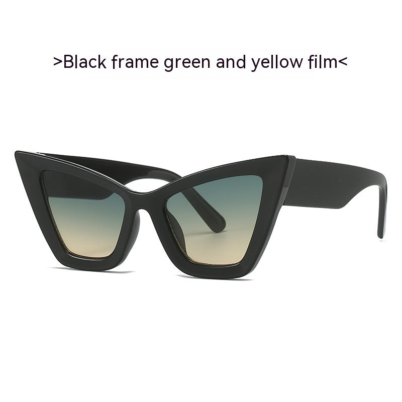 Black frame sunglasses with green and yellow gradient lenses on a white background