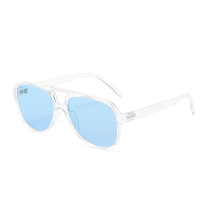 Clear frame sunglasses with blue lenses on a white background