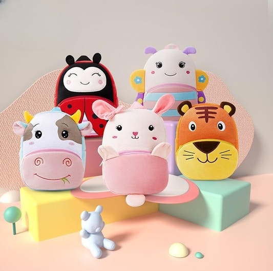 Set of plush animal face kids backpacks with smiling faces and soft fabric bodies