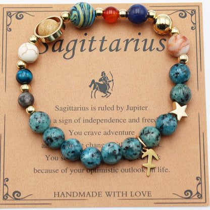 Sagittarius zodiac stone bracelet with blue and orange beads, gold tone accents, star charm