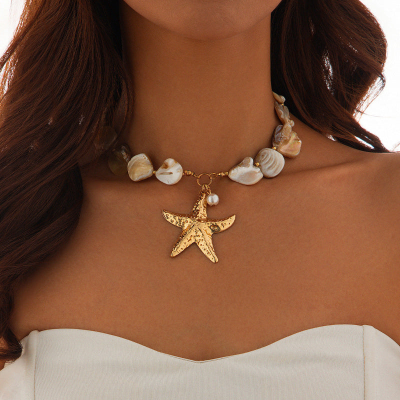 Women's Necklace with starfish pendant and shell beads on a person