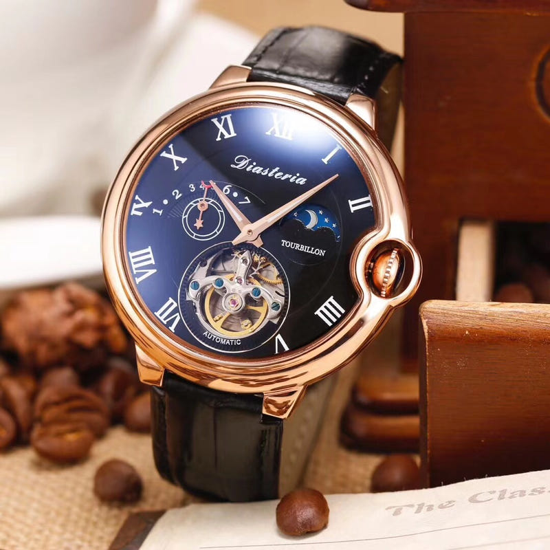 Mechanical tourbillon watch with dark blue dial, Roman numerals, black leather strap, gold case