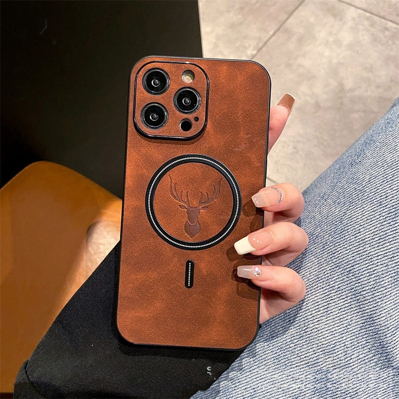 Copper-brown phone case with deer emblem circle, quad camera cutouts, and side slot