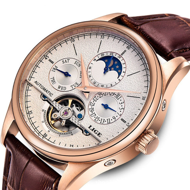 Automatic calendar watch close-up: moonphase subdials, rose-gold case, brown leather strap