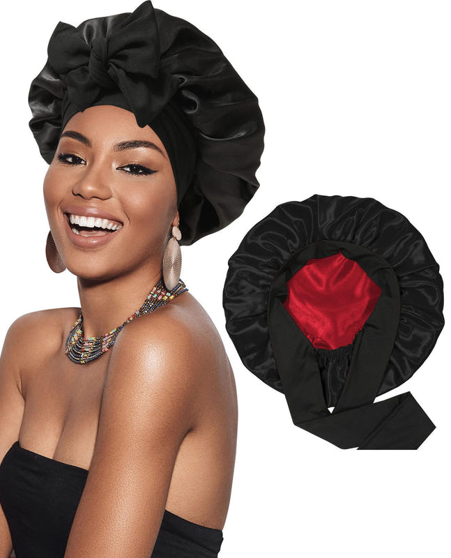 Satin ribbon round cap in black satin with a red heart detail and gathered bow