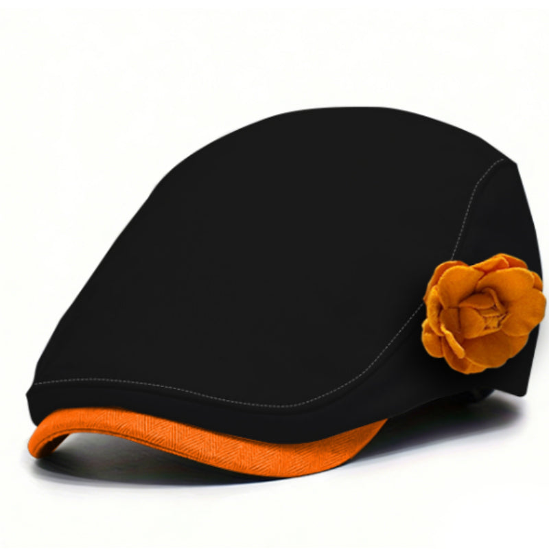 Black fabric beret with orange flower accent and contrast orange brim trim.