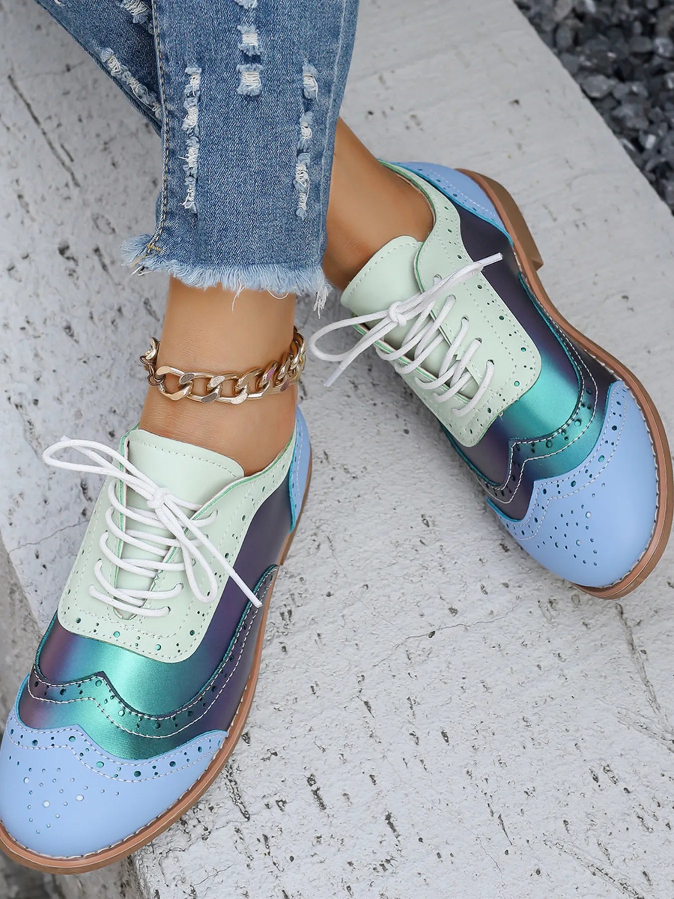 Pastel blue and mint color-block lace-up flats with round toe and white laces