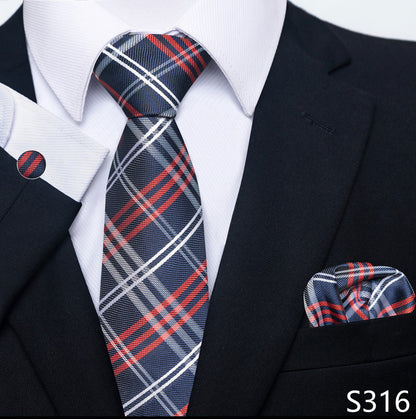 Navy suit with a plaid tie and matching pocket square, featuring the number S316.