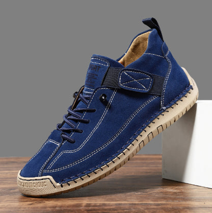 Men's mid-top leather lace-up shoe in bright blue with side panel stitching and rope sole.