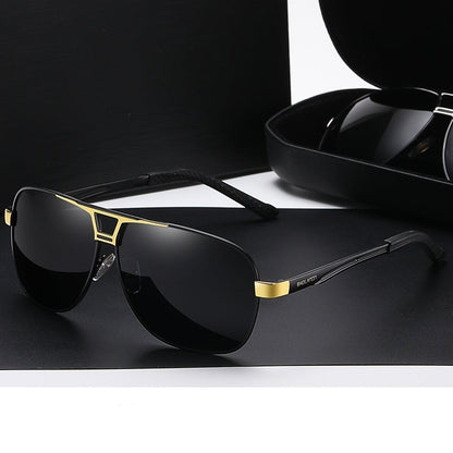 Black gold frame sunglasses with a gray tablet on a dark background