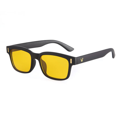 Black sunglasses with yellow lenses on a white background