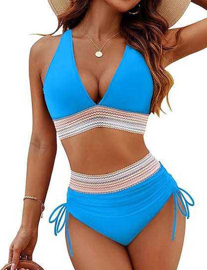 Blue and white striped swimsuit worn by a model on a white background