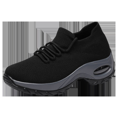 Black sneaker with gray sole on a white background
