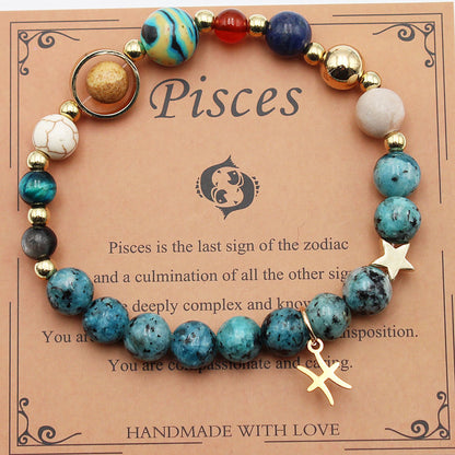 Zodiac bracelet with turquoise and white beads, gold-tone accents, and Pisces star charm