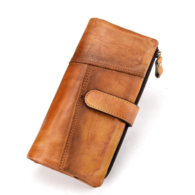 Tan leather long wallet with front card slot and top zipper