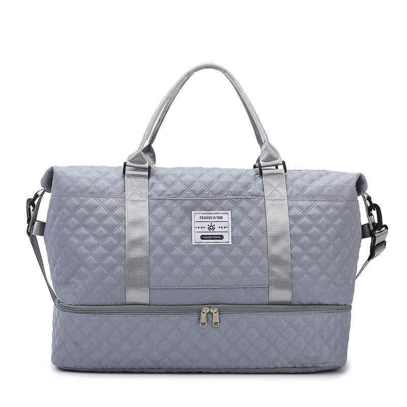 Light lavender quilted travel bag with front zip and matching crossbody pouch