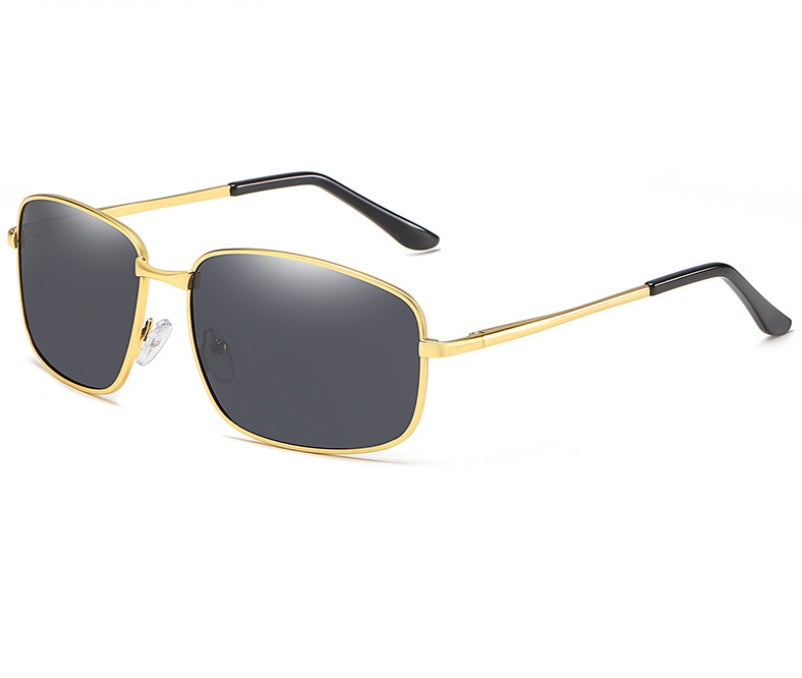 Gold-framed sunglasses with black lenses on a white background