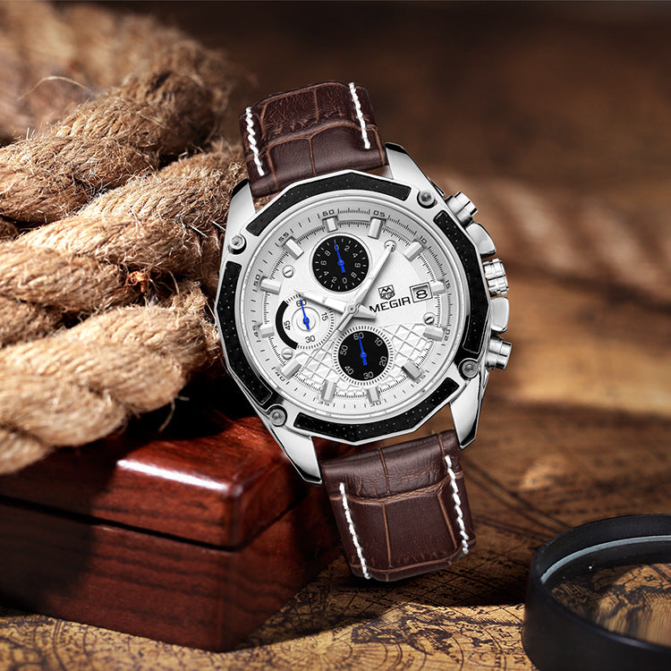 MEGIR men's quartz watch with white dial, three subdials and brown stitched strap beside a rope