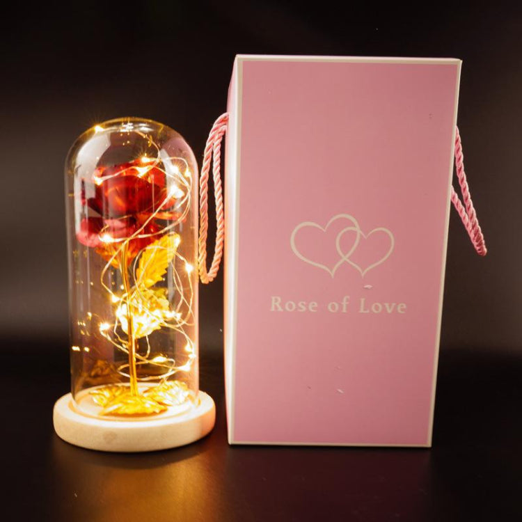 Glowing LED glass dome rose lamp with red rose, paired with pink Rose of Love box