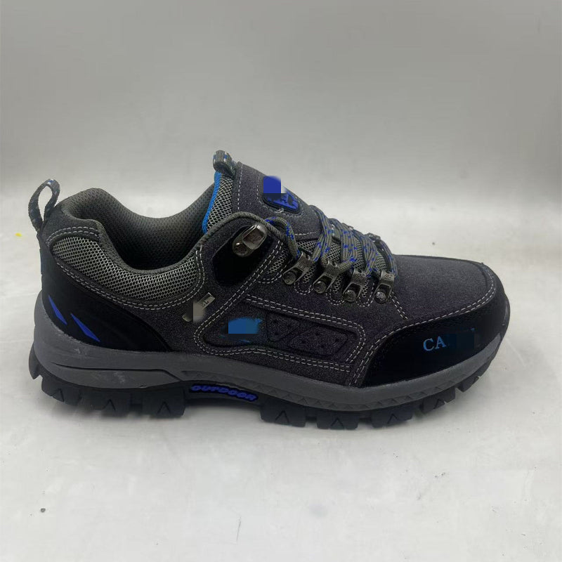 Gray and blue hiking shoe on a white background