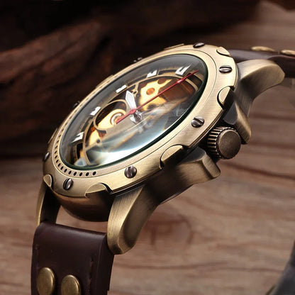 Bronze-tone automatic skeleton watch with dark brown leather strap, angled side profile view