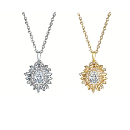 Two sunflower-shaped pendants on chains, one silver and one gold, on a white background.
