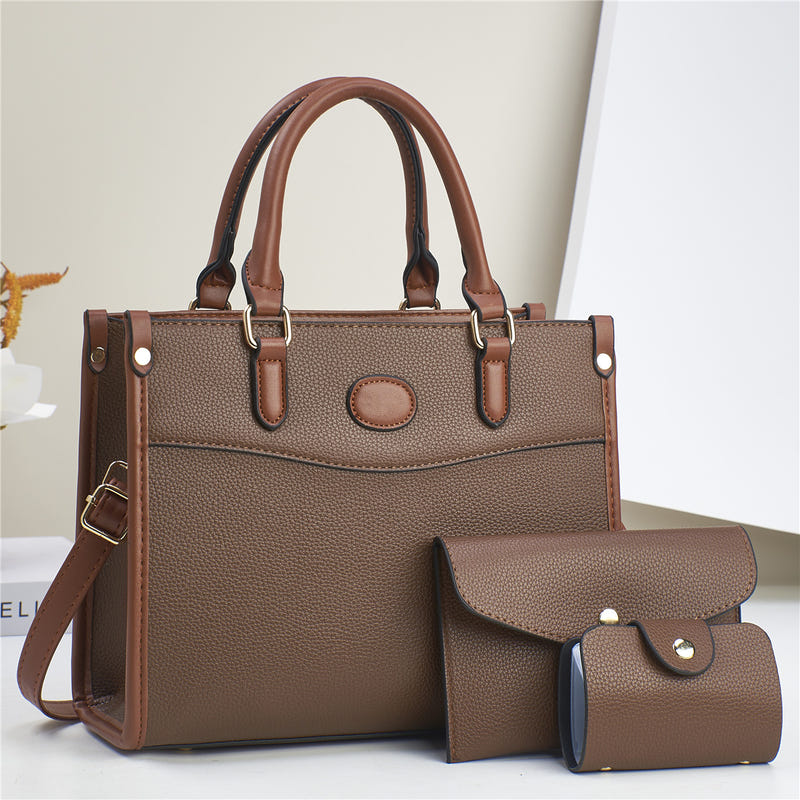 Three-piece shoulder bag set in taupe with brown trim: structured tote plus two pouches