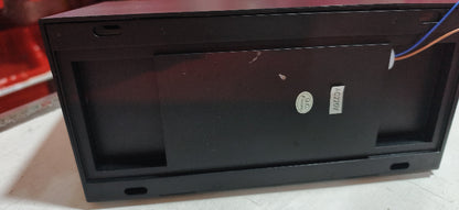 Black back housing of rectangular outdoor wall lamp with mounting holes and wiring