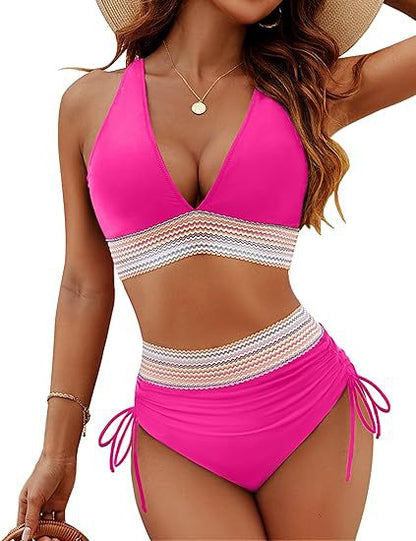 Woman wearing a pink bikini with a white and beige patterned accent on a white background