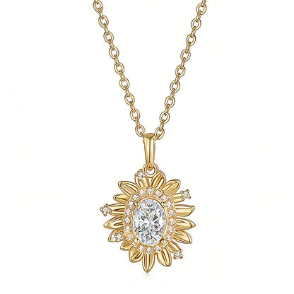 Gold necklace with a sunflower-shaped pendant on a white background