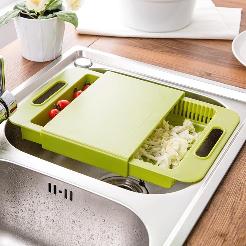 Green multifunction kitchen chopping board with slicer insert and side grips