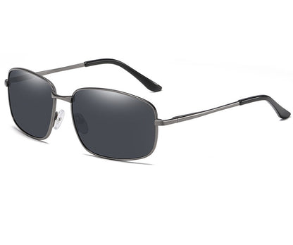 Sunglasses with dark lenses and thin metal frame on a white background