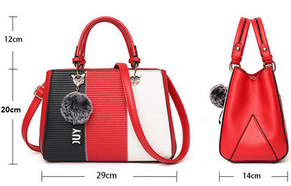 Red, black, and white handbag with measurements on a white background