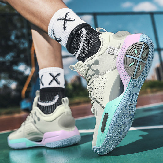 Close-up of a person wearing stylish sneakers on a basketball court.