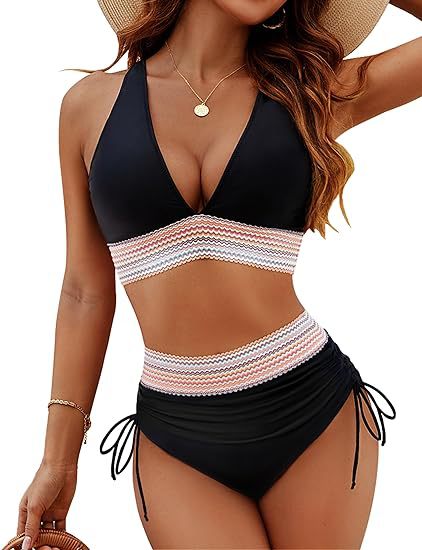 Black and white striped swimsuit with a hat on a white background