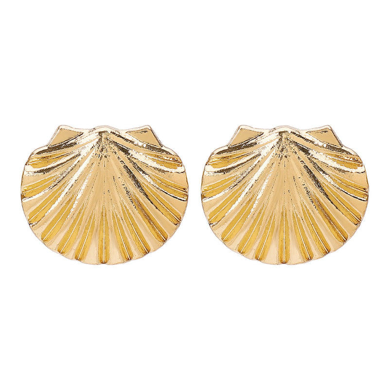 Gold scallop-shell stud earrings with textured ridged design