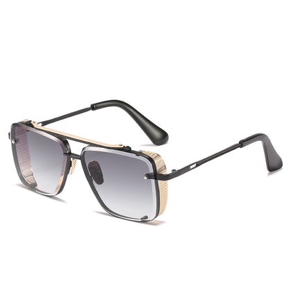 Sunglasses with black and gold frame on a white background