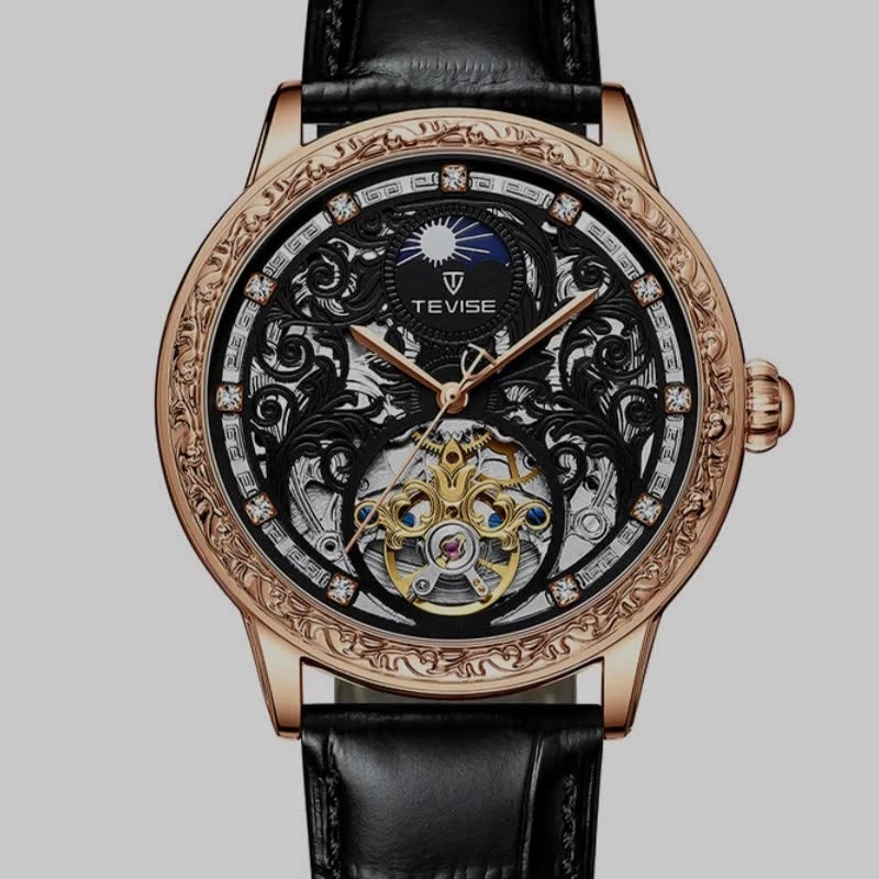 Luxury watch with intricate design and black leather strap on a gray background