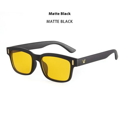 Sunglasses with yellow lenses and matte black frame on a white background