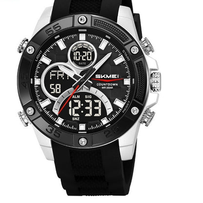 Black and silver digital watch with a white background