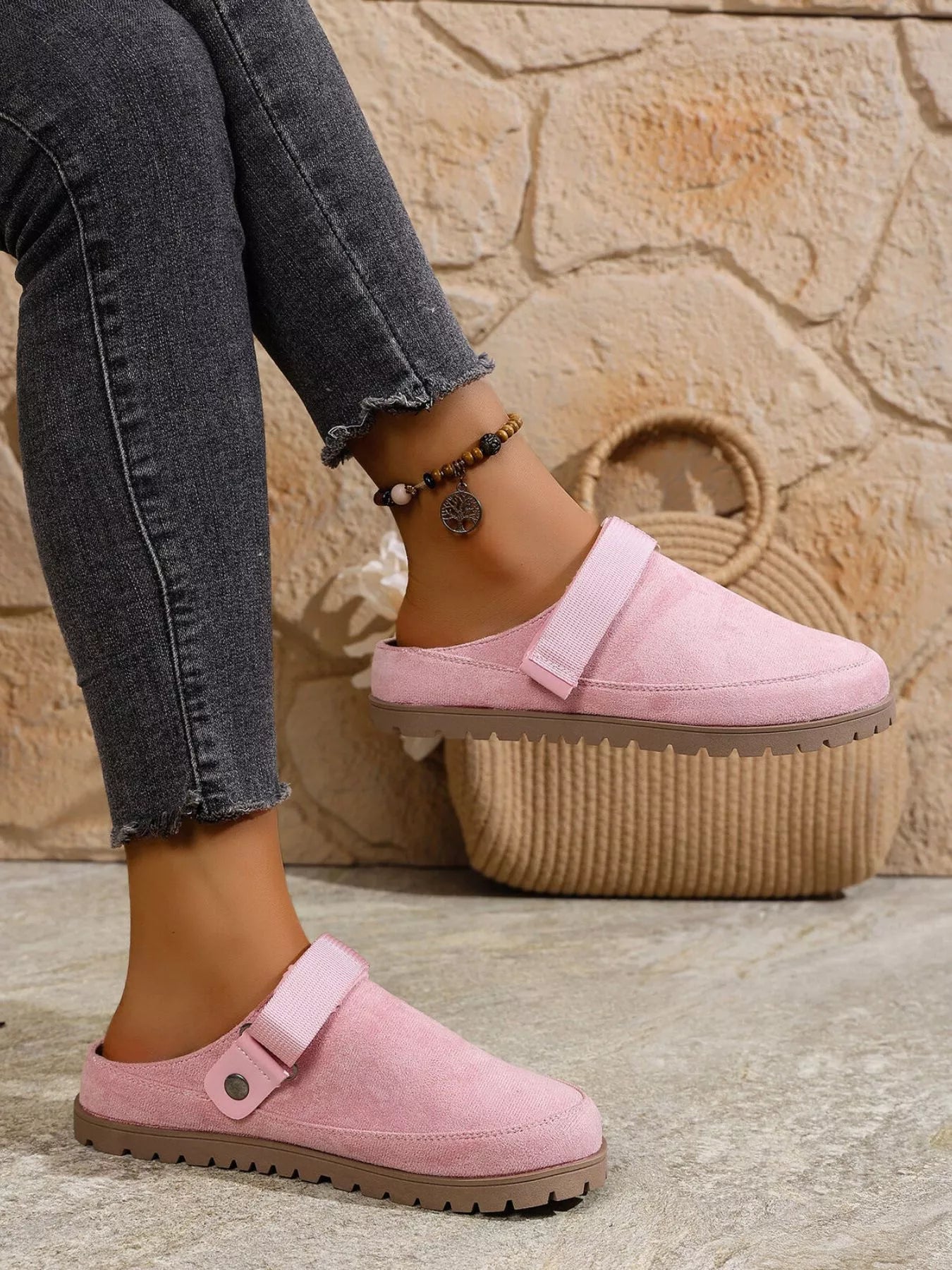 Pink round-toe slip-on flats with side strap and bead ankle bracelet detail