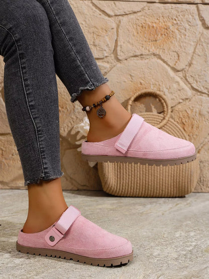 Pink round-toe slip-on flats with side strap and bead ankle bracelet detail