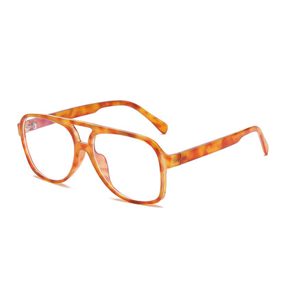 Tortoiseshell eyeglasses on a white background
