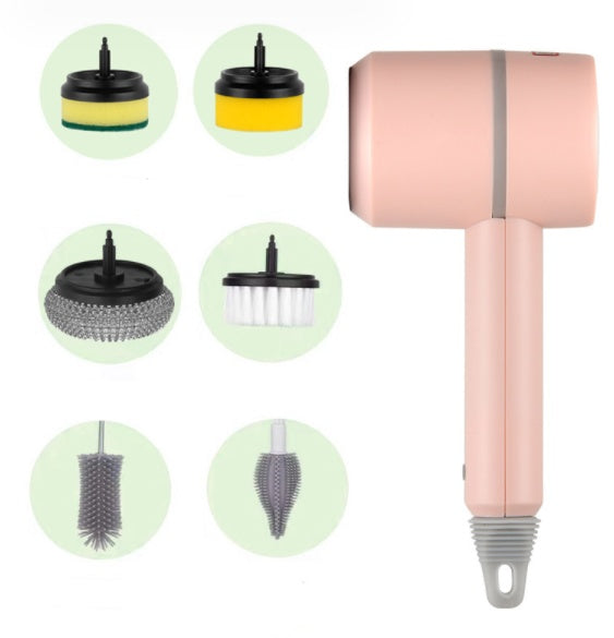 Pink hair dryer with cleaning brush attachments on a white background